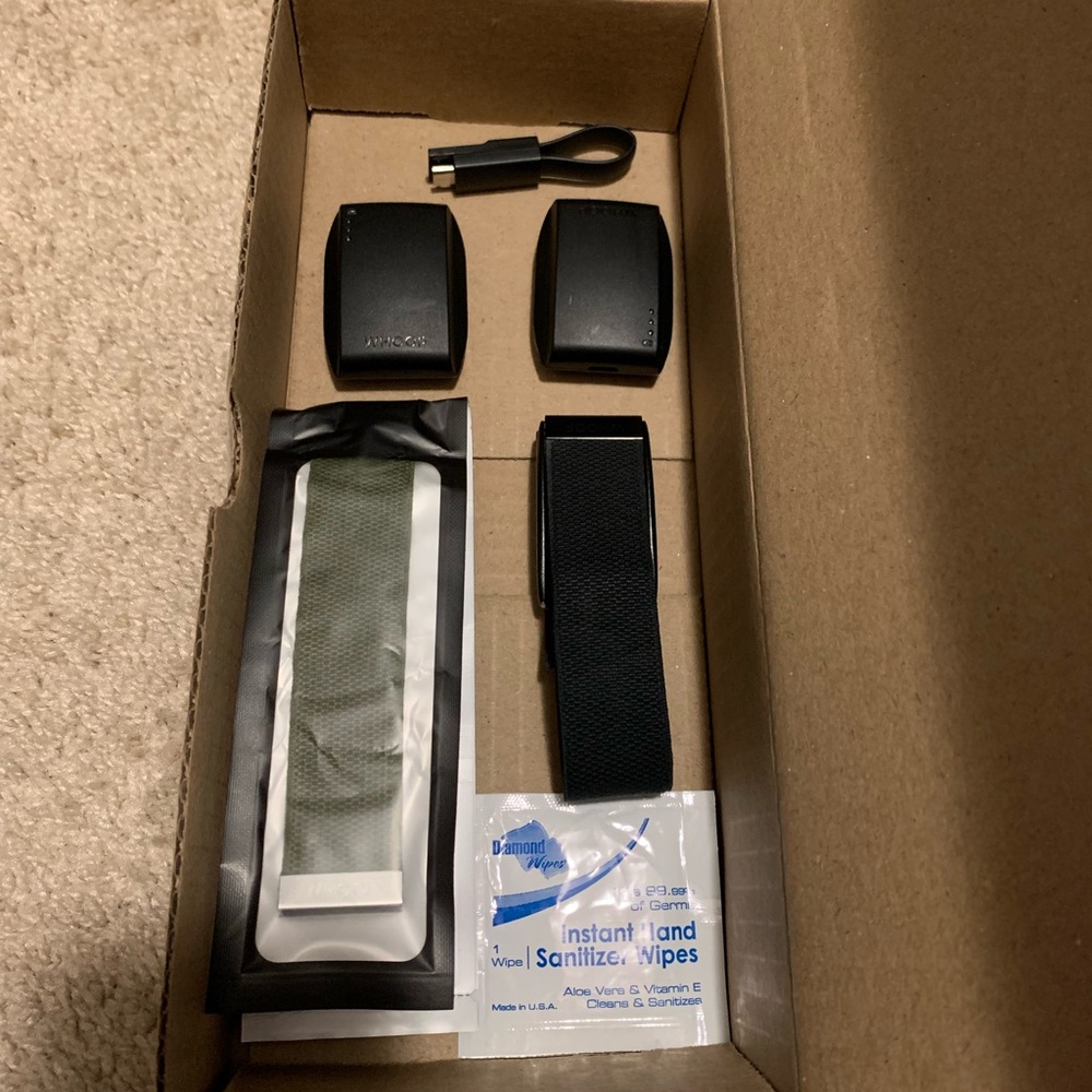 Whoop 3.0, three straps, two portable chargers, charging cable